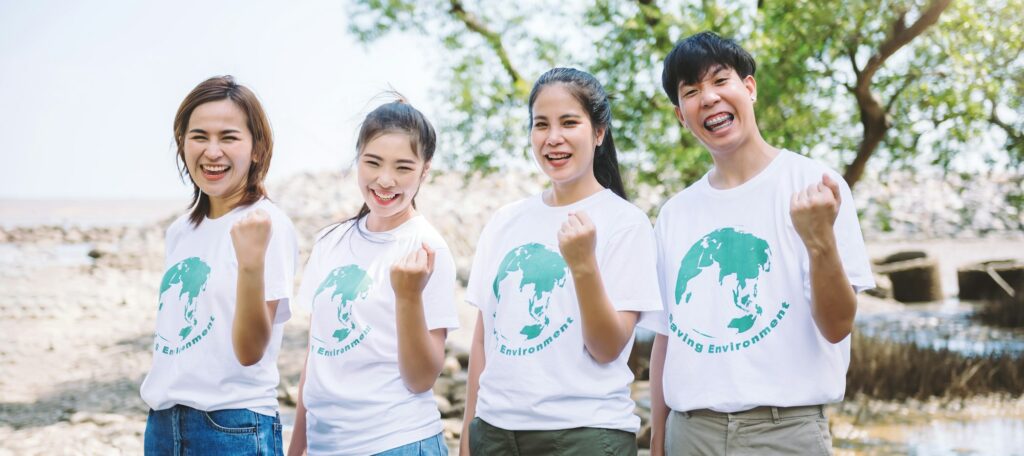 Volunteer group of diverse asian people joining charity event to showing teamwork spirite